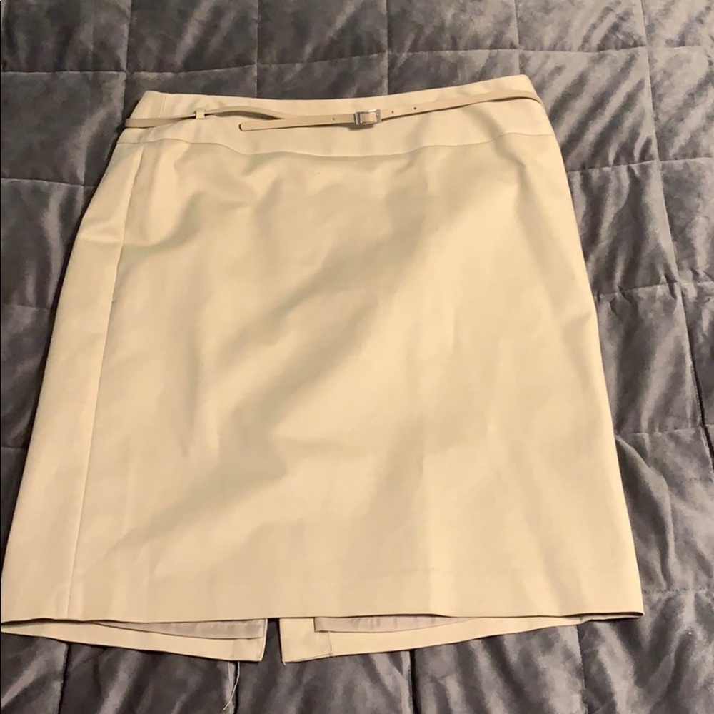 Tan pencil skirt. (Missing one belt loop (fixable)